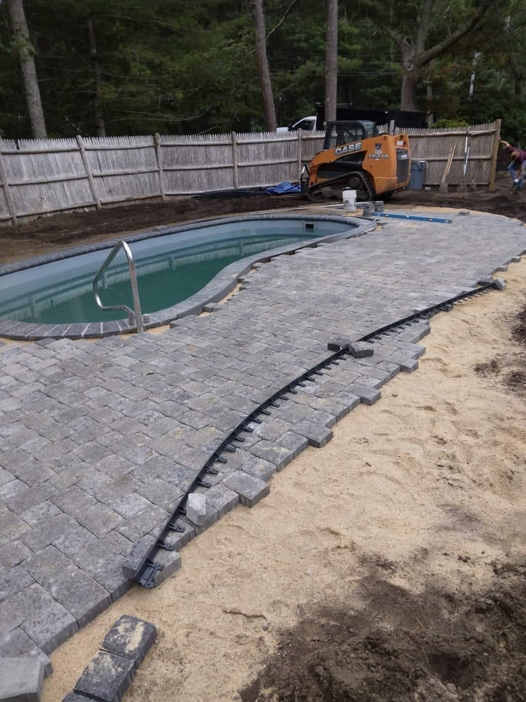 Poolside Paving Stone Installation image