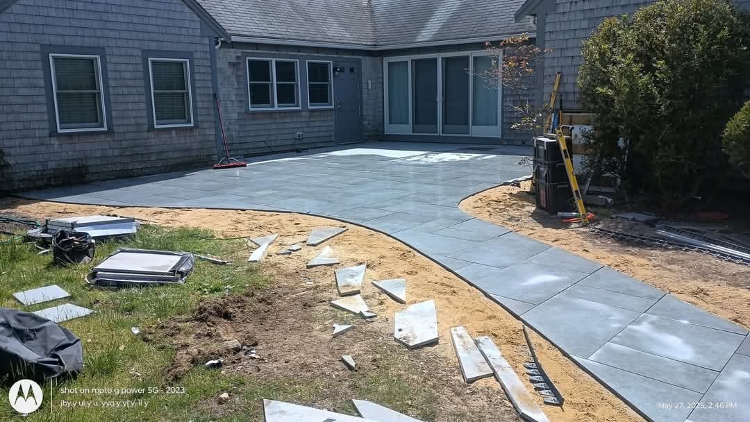 Charming Stone Patio and Walkway Installation in Backyard